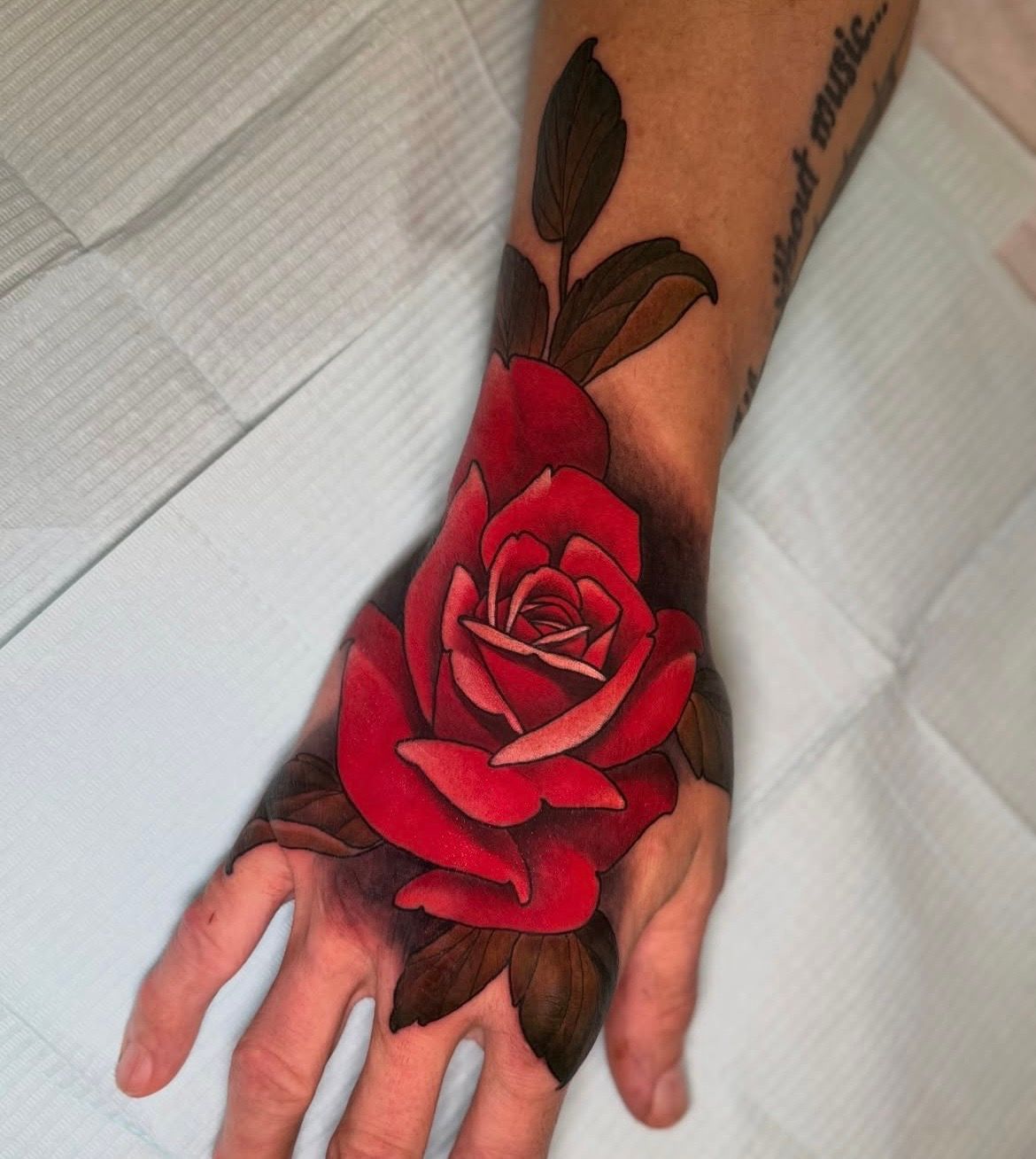 Rose Tattoo by Sasha Day at Crimson Empire Tattoo in Edmonton Alberta Canada