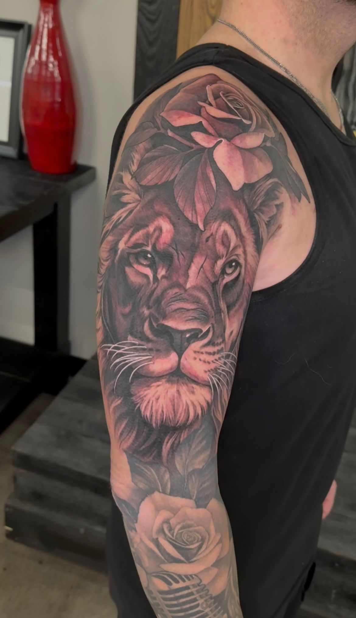 Lion and Rose Tattoo by Sasha Day at Crimson Empire Tattoo in Edmonton Alberta Canada