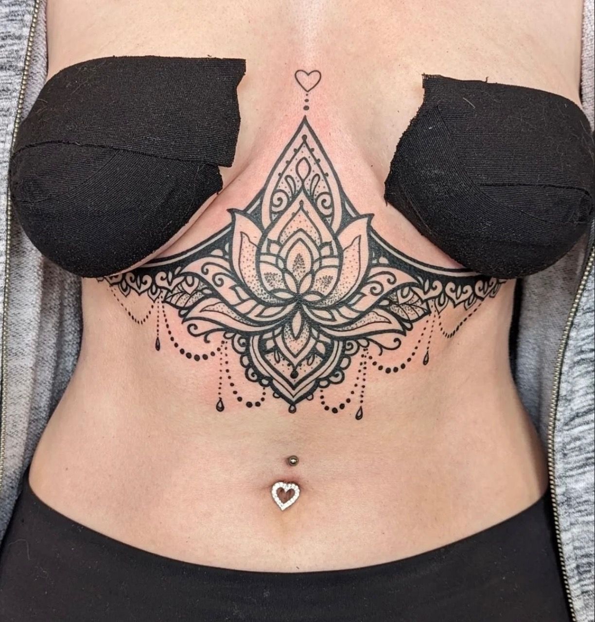 Ornamental Sternum Tattoo by Amber Strange at Silver Ghost Tattoo in Edmonton Alberta Canada
