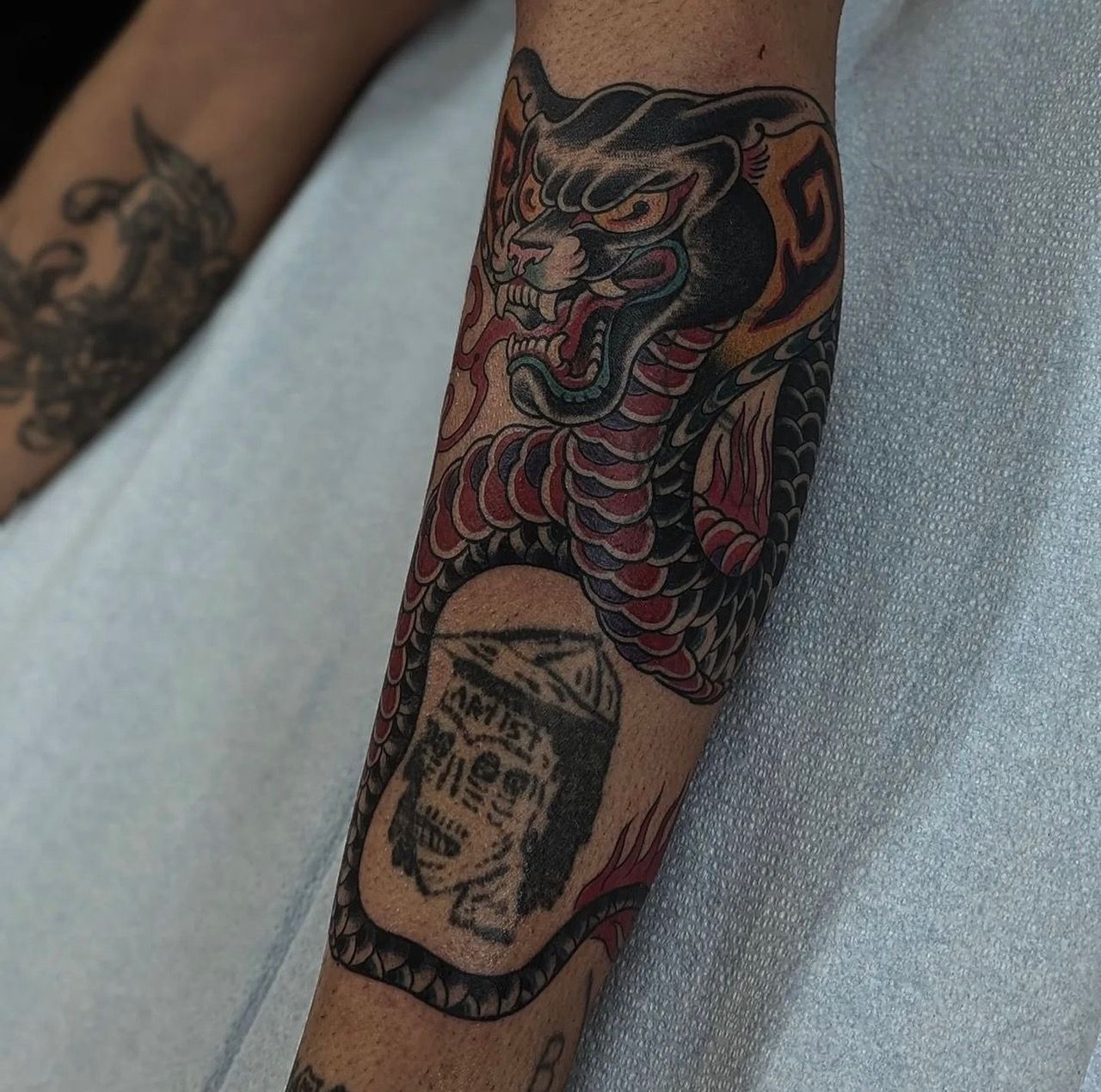 Panther Cobra Tattoo by Chris Benson at Silver Ghost Tattoo in Edmonton Alberta Canada