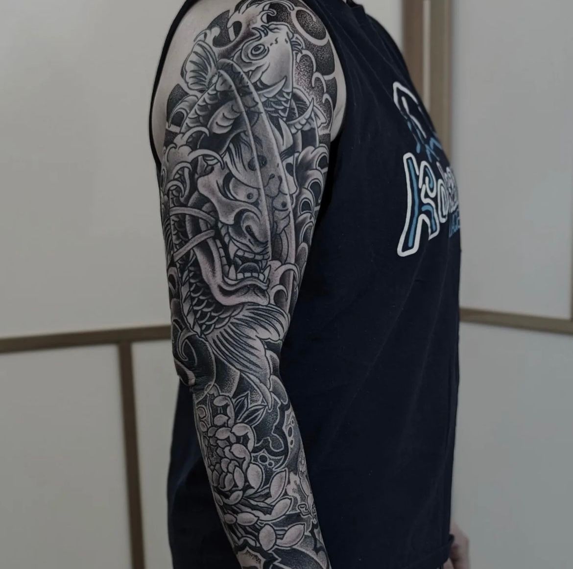 Hannya, Koi and Chrysanthemum Sleeve by Chris Benson at Silver Ghost Tattoo in Edmonton Alberta Canada