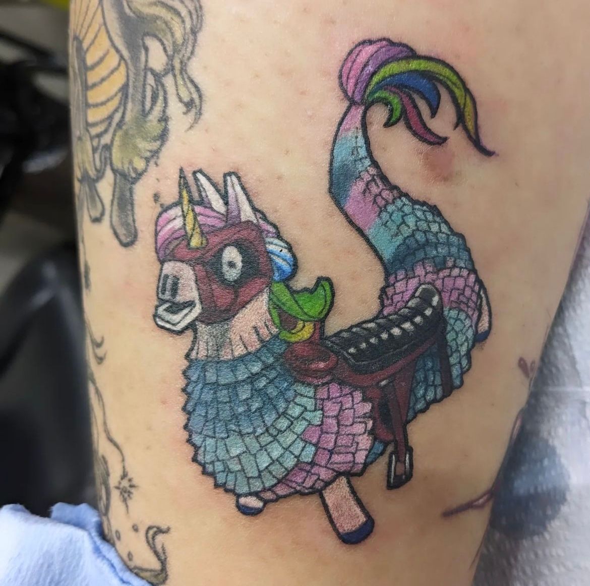 Fortnite Party Pinata Tattoo by Kevin Sherritt at Black Gold Tattoo Co in Edmonton Alberta Canada
