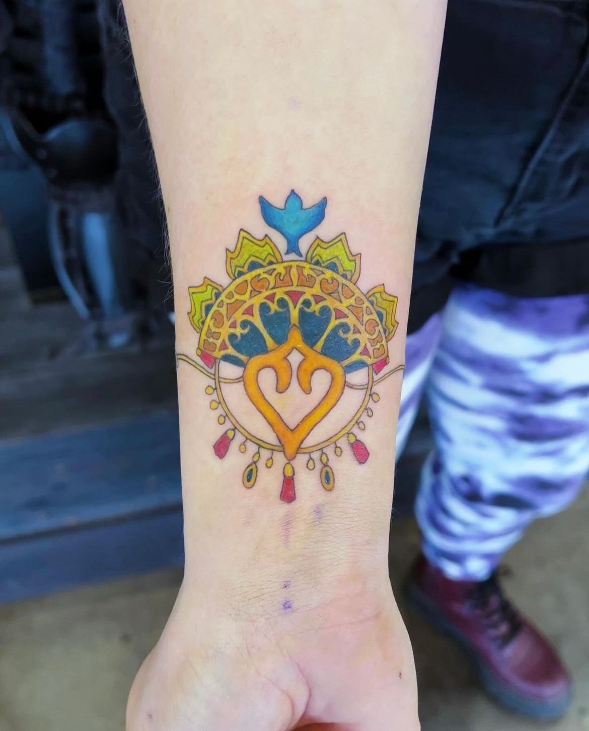 Custom Charm Tattoo by Vinny Nguyen at Crimson Empire Tattoo in Edmonton Alberta Canada