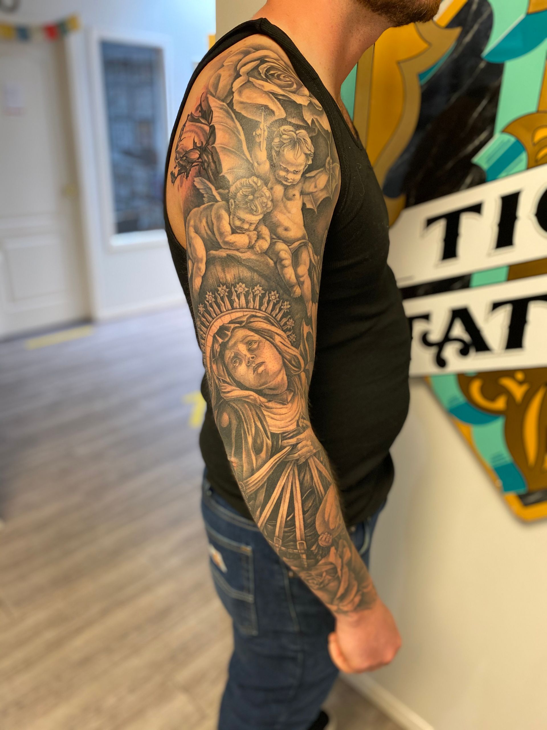 Religious Sleeve by Brain Dangerfield at Black Gold Tattoo Co in Edmonton Alberta Canada