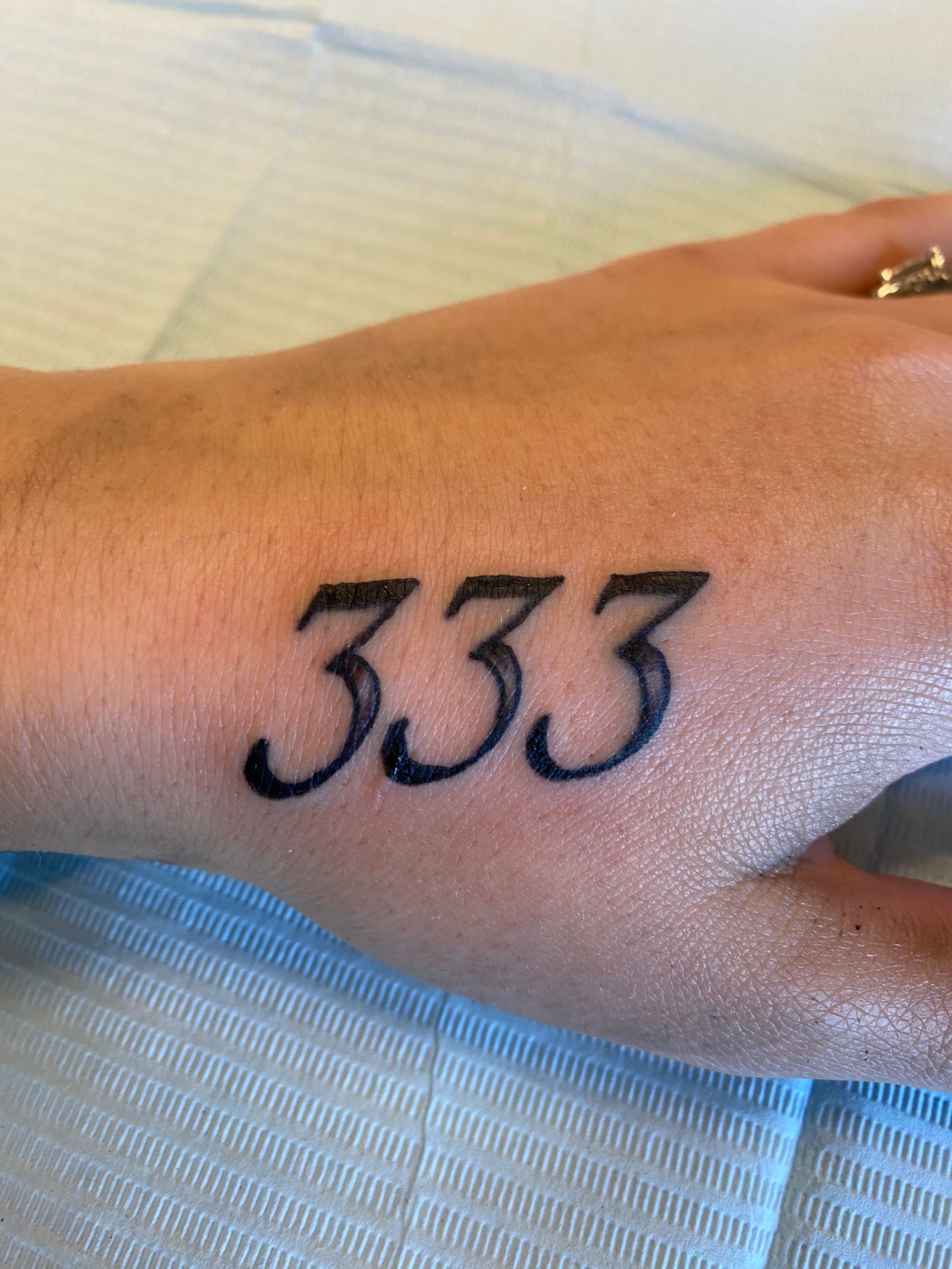 Angel Numbers Tattoo by Keon Courtney at Crimson Empire Tattoo in Edmonton Alberta Canada