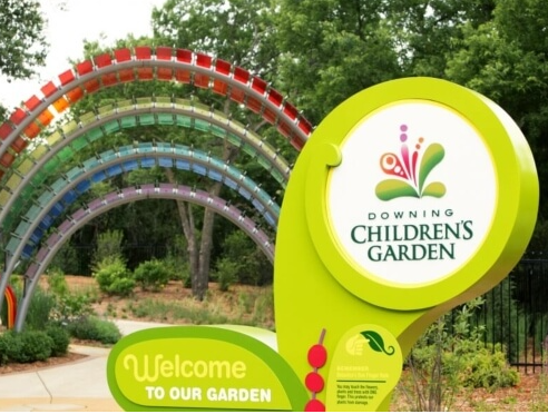 A welcome sign for the downing children 's garden