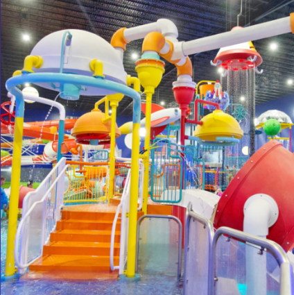 A water park with lots of pipes and stairs