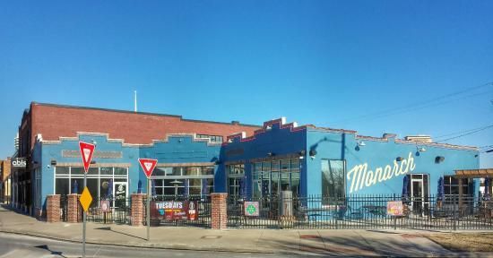 A blue and red building with the word monarch on it.