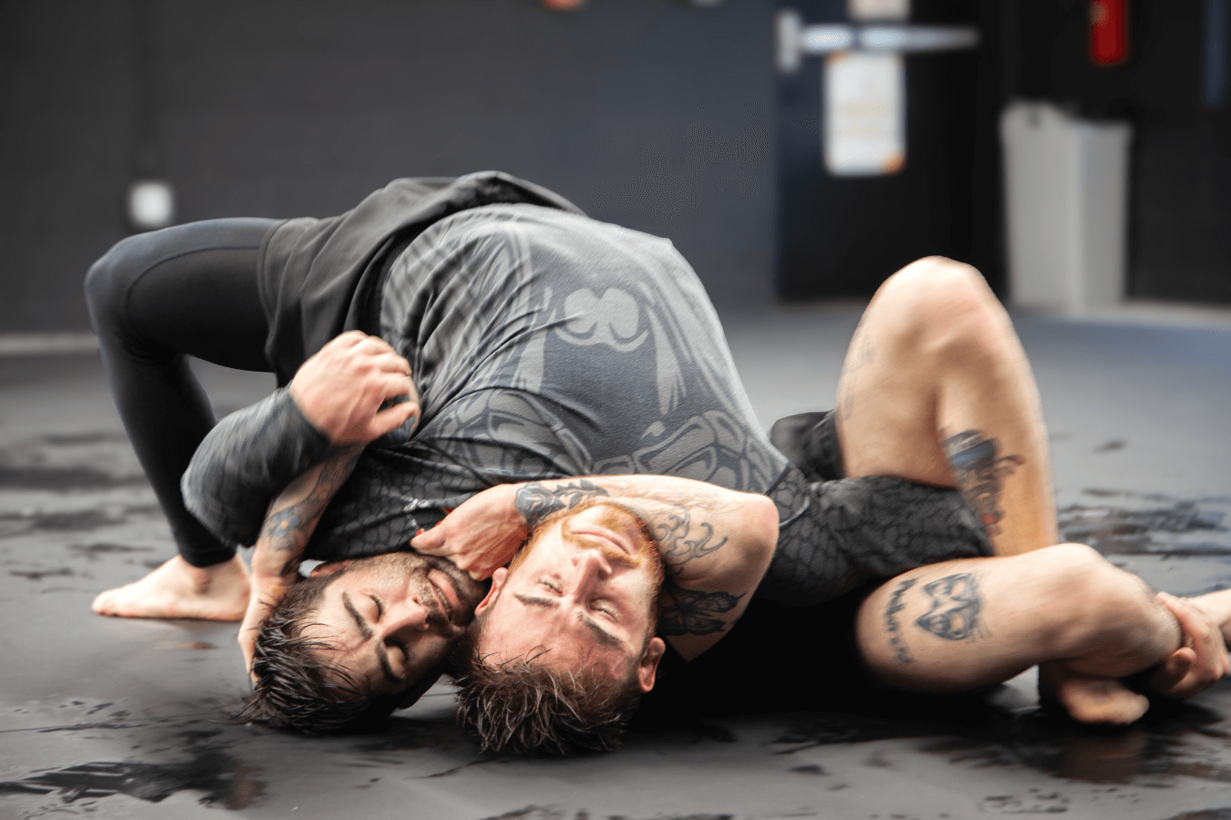 Adults training grappling rounds at Connecticut Submission Grappling in Bridgeport, CT for full-body fitness and confidence