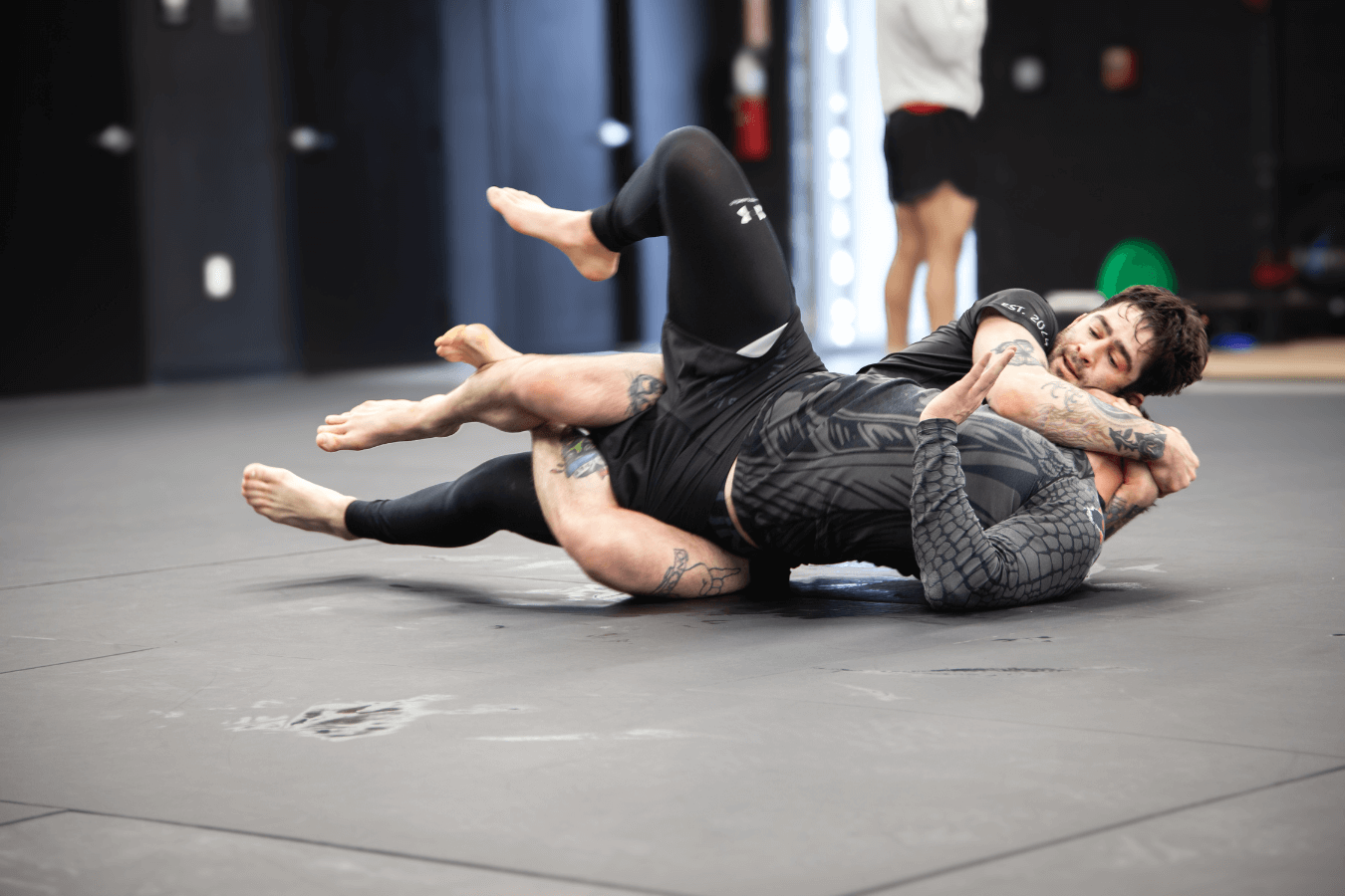 Adults practicing Grappling at Connecticut Submission Grappling in Bridgeport, CT to build focus and mental clarity.