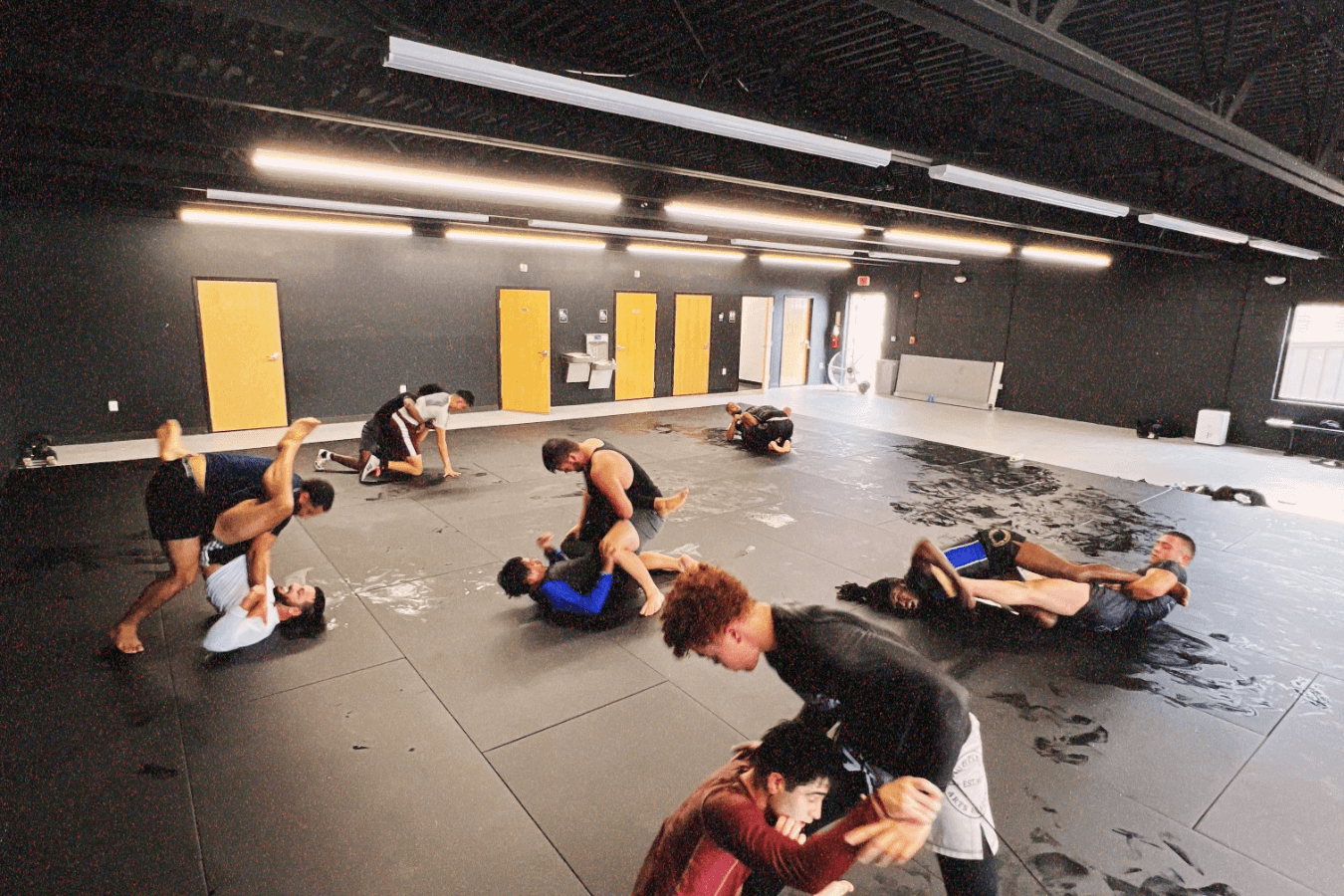 Teens practice No-Gi grappling rounds at Connecticut Submission Grappling in Bridgeport, CT, building discipline.