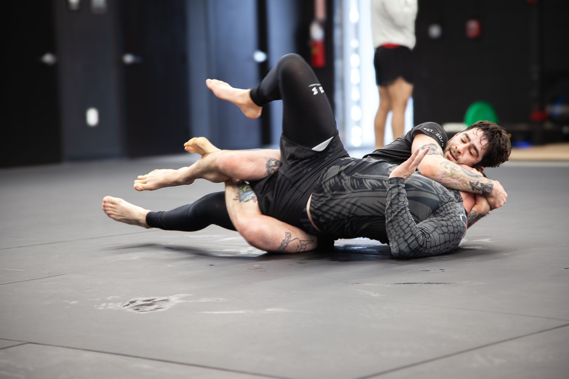 No-gi students train live rounds at Connecticut Submission Grappling in Bridgeport, CT for fitness.