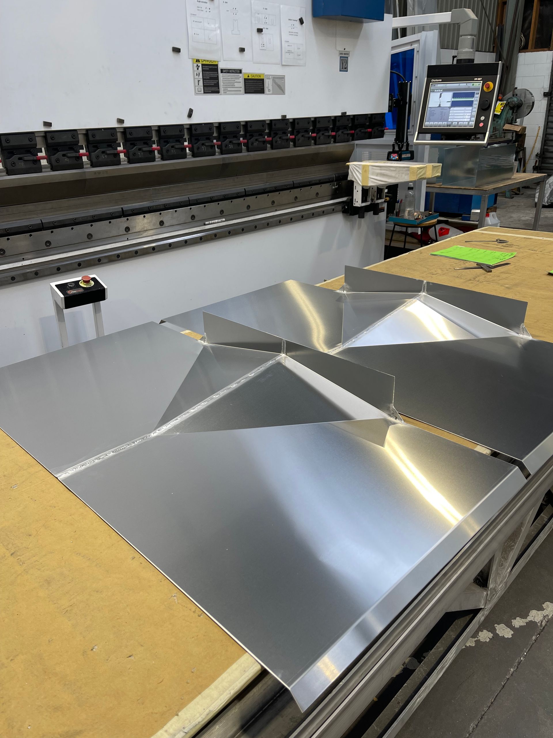 A bunch of metal boxes are stacked on top of each other.