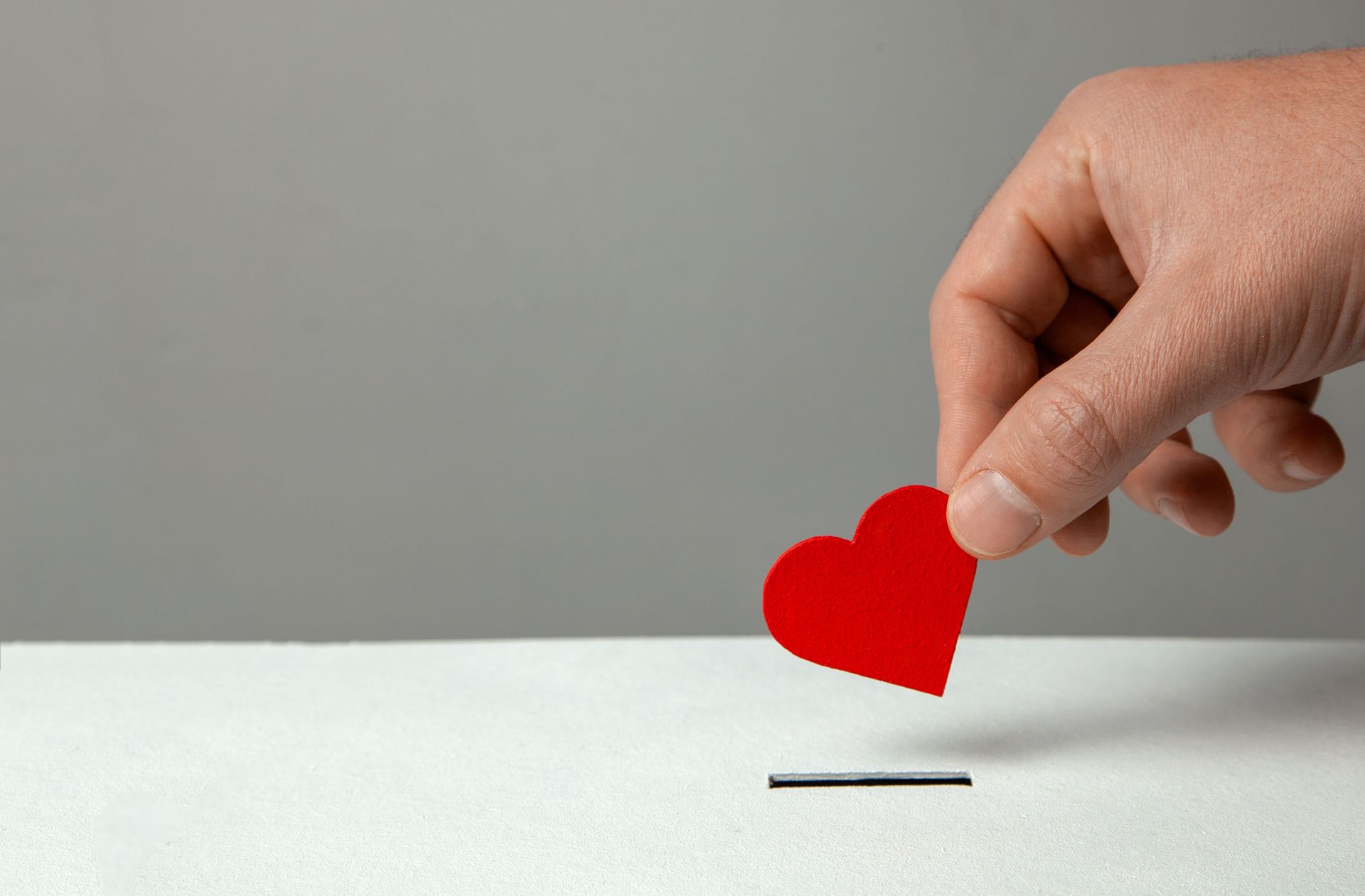 heart put in a donation box