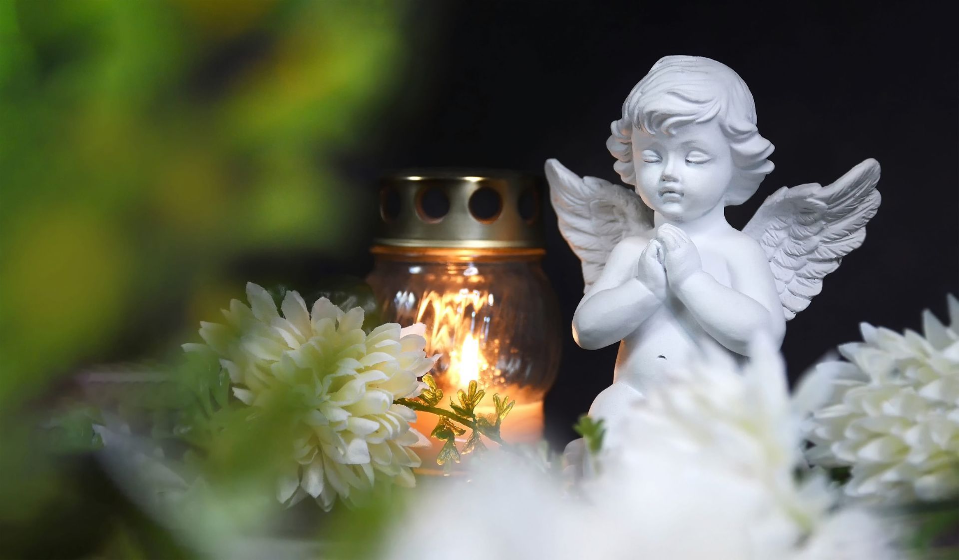 Condolence card with funeral candle, angel and flower