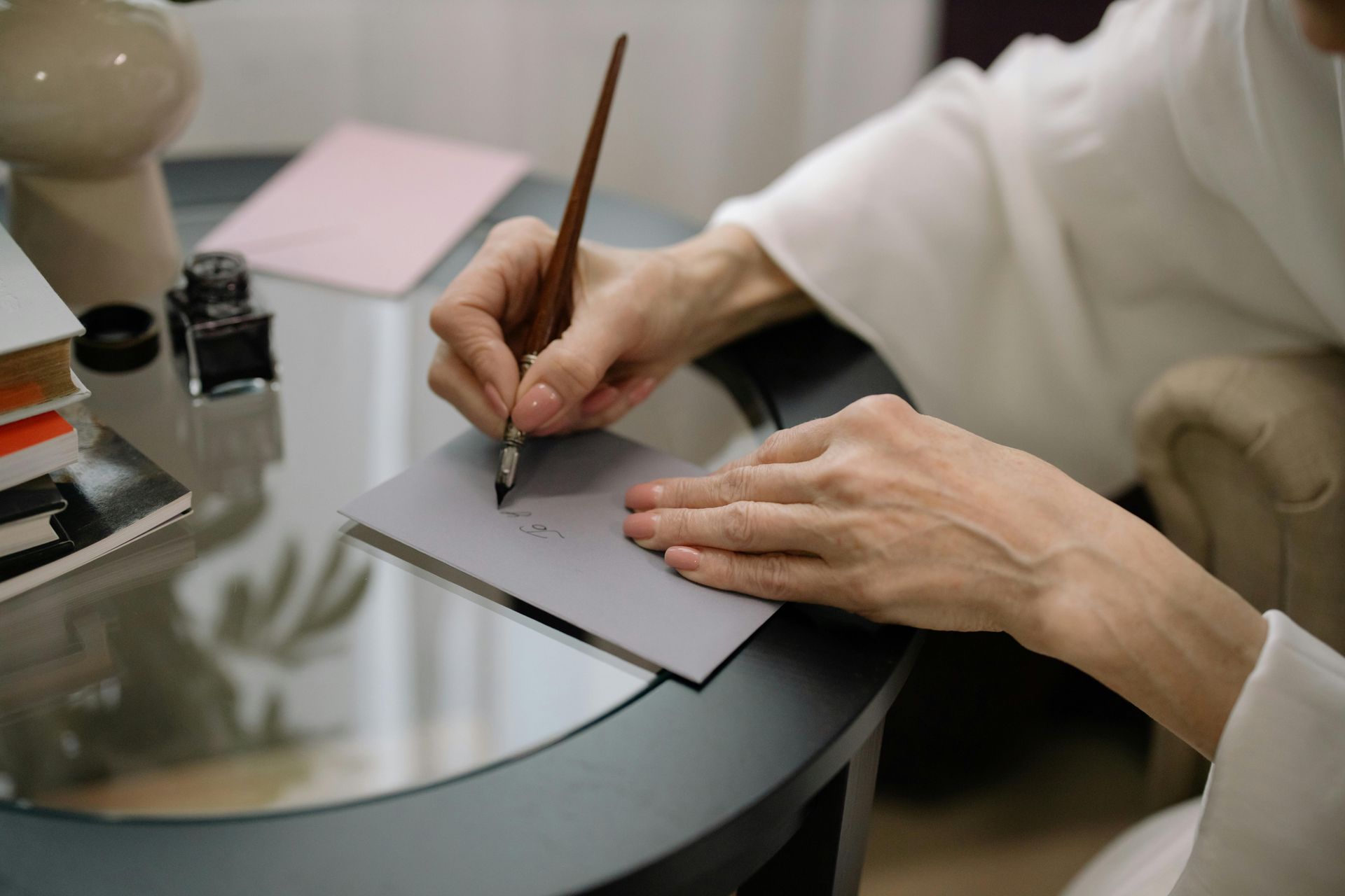 woman writing a card