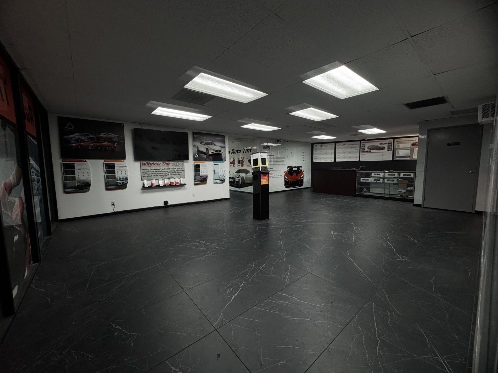 Two cybertrucks facing our shop. 