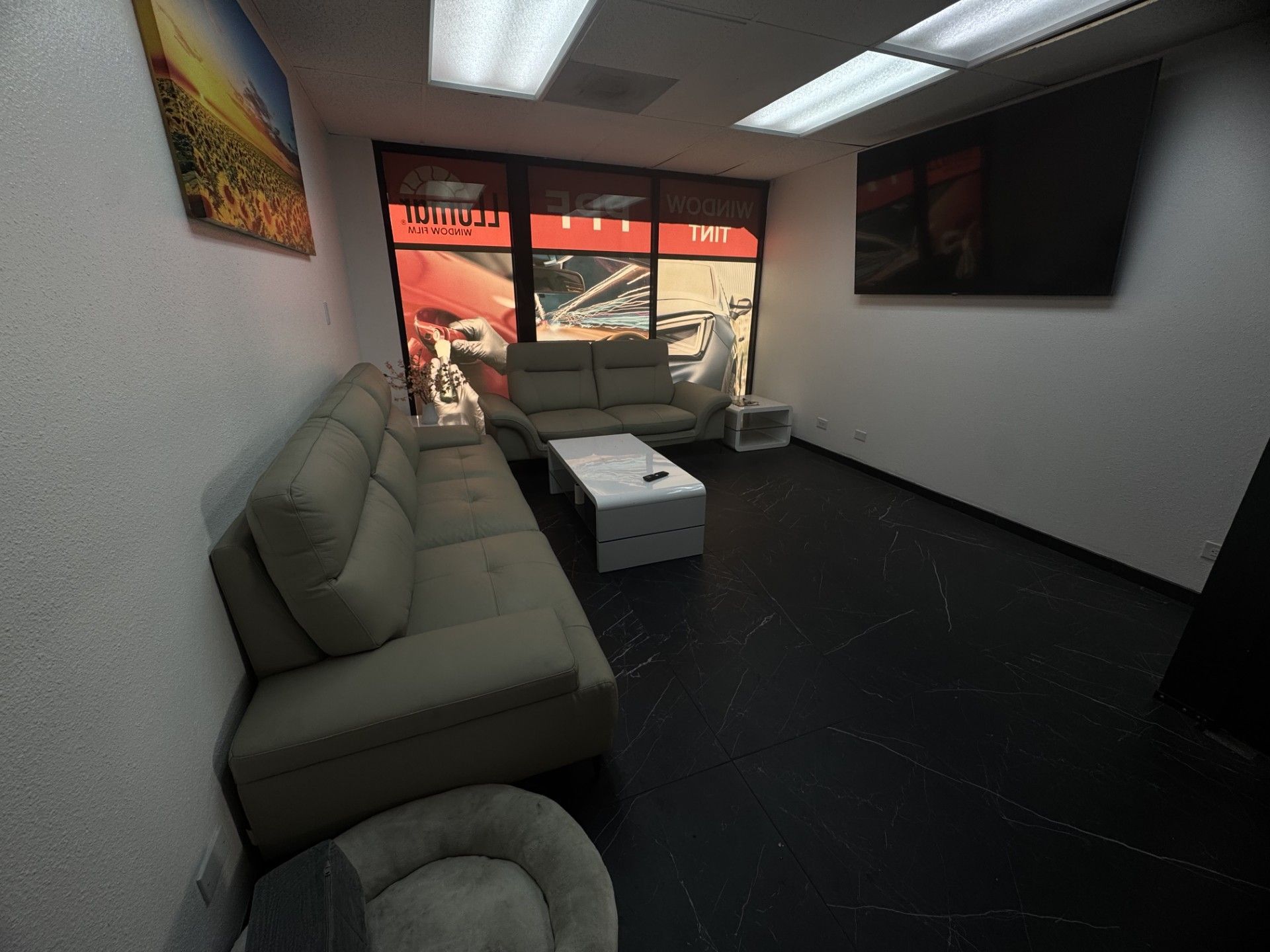 Cadillac Escalade V posing for a photo outside of our shop.