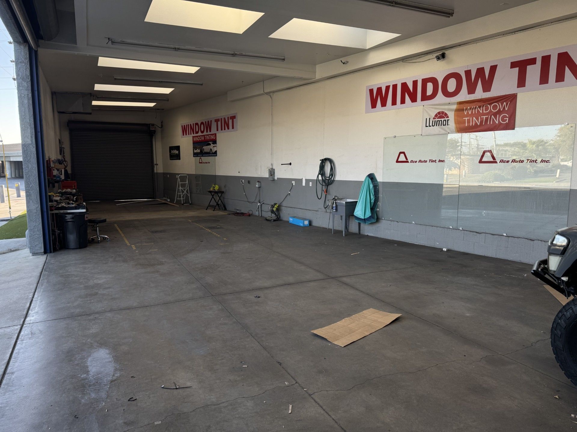 Cadillac Escalade V posing for a photo outside of our shop.