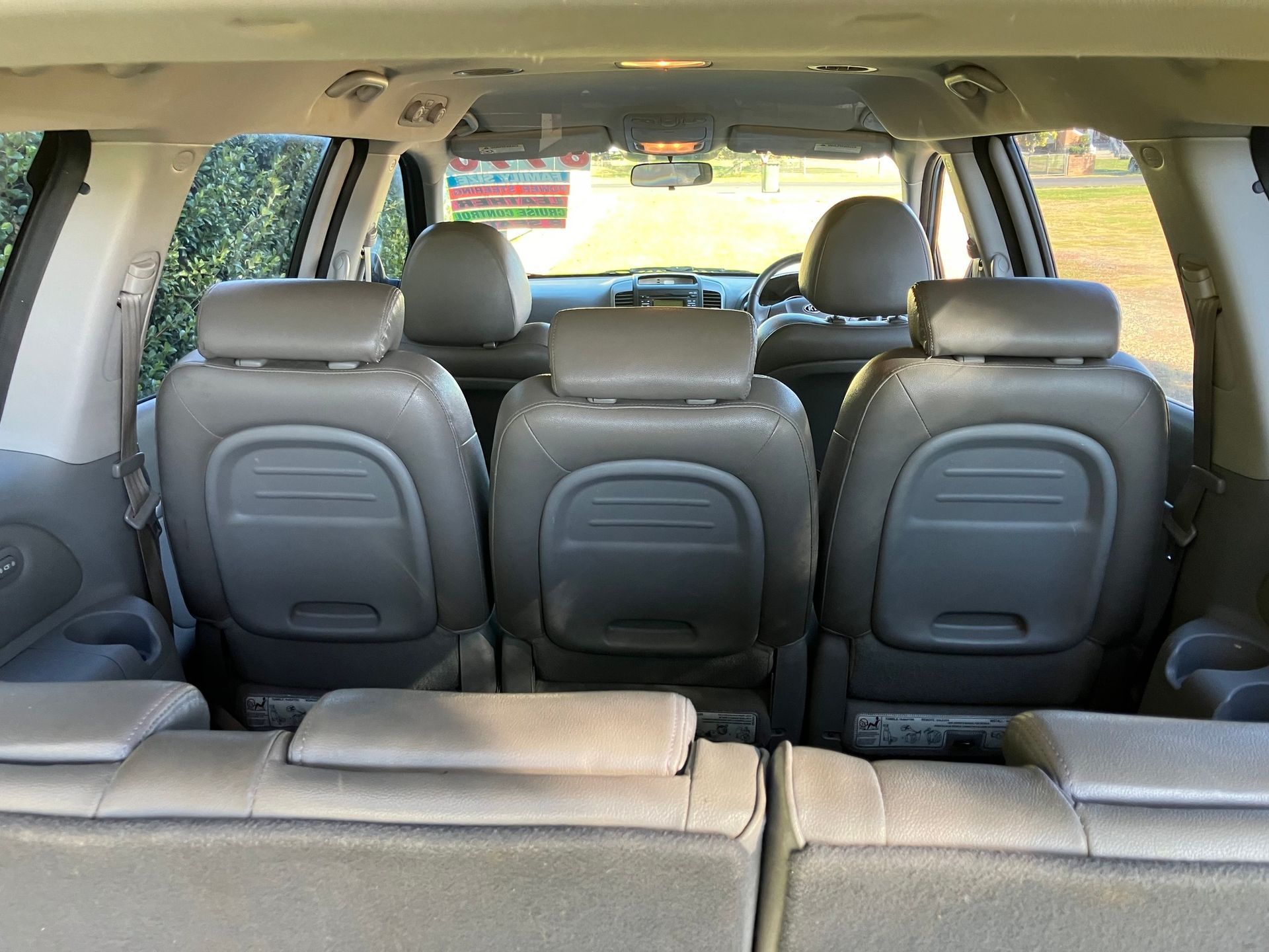 Rear Seats of a Minivan With Gray Headrests — Great Western Auto Wreckers in Orange, NSW
