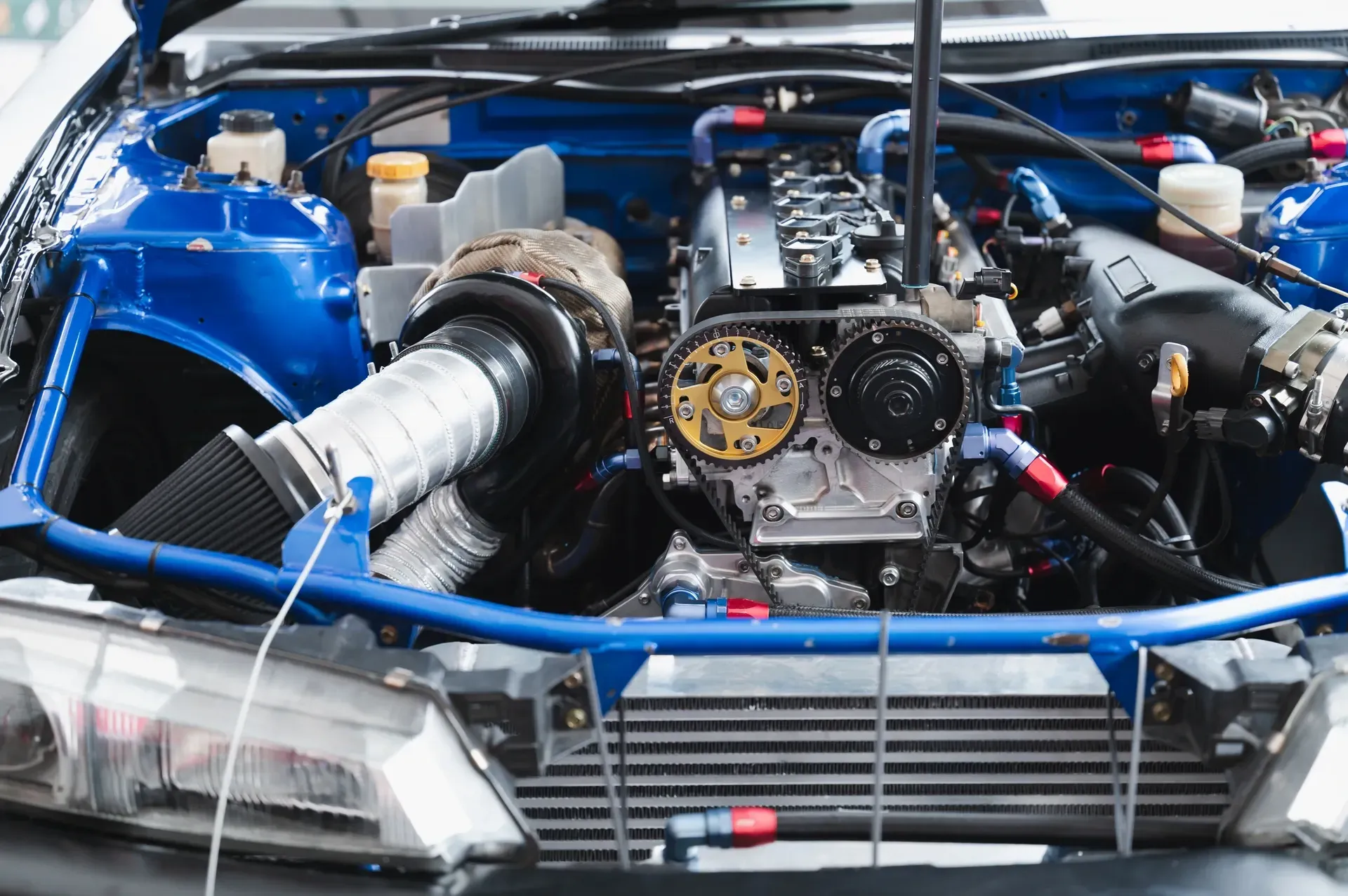 Blue Race Car Engine With Exposed Components — Great Western Auto Wreckers in Orange, NSW