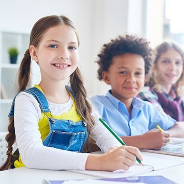 Smiling children in a classroom