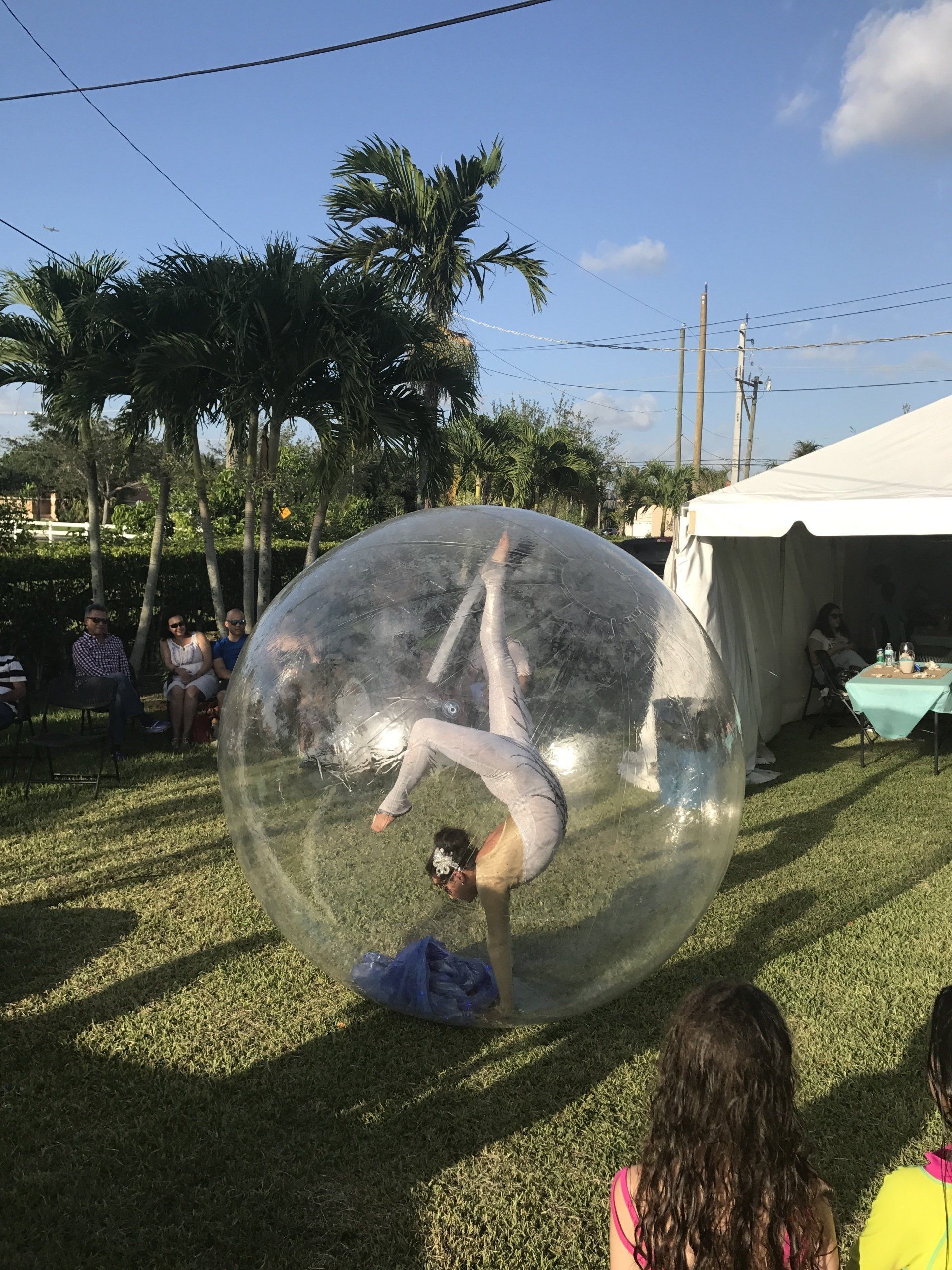 Milanus Circus, Miami, FL, contortion in a ball performance.