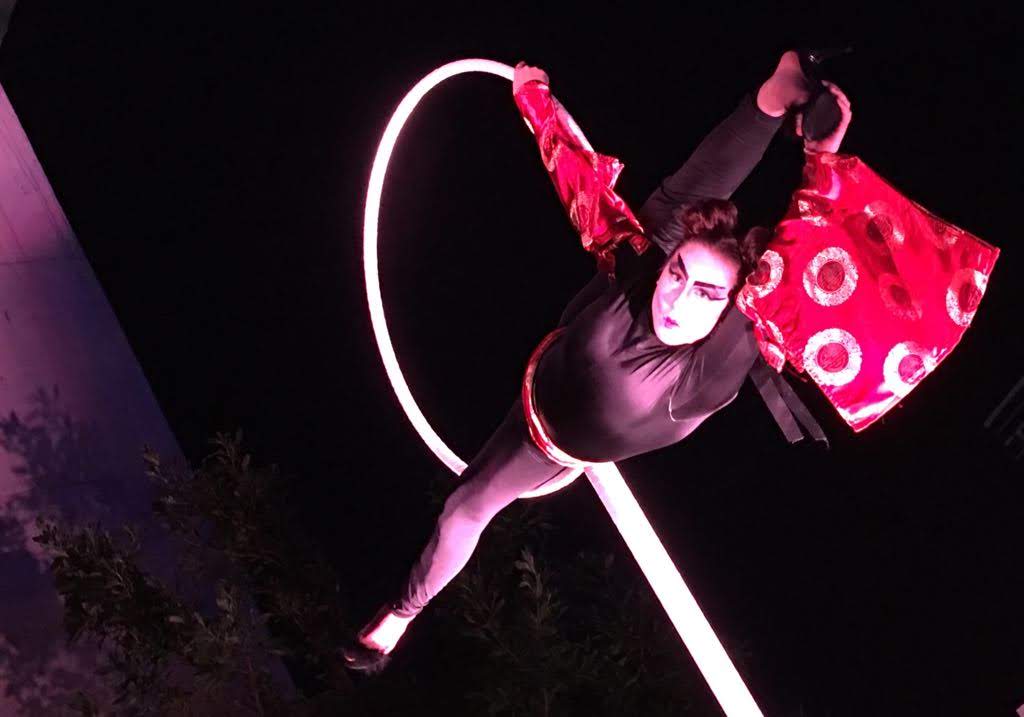 Milanus Circus, Miami, FL, lollipop lyra acrobatic performer.