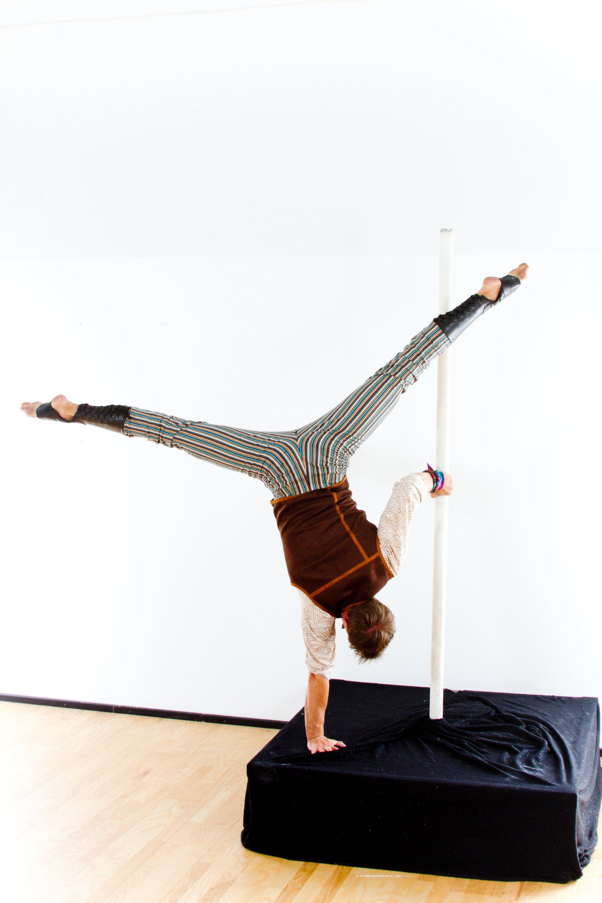 Milanus Circus, Miami, FL, pole entertainment.