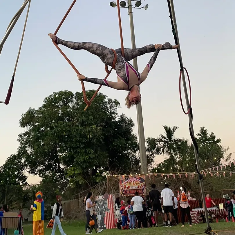 Image of a trapeze performance. Photo for Milanus Circus, Miami, Florida.