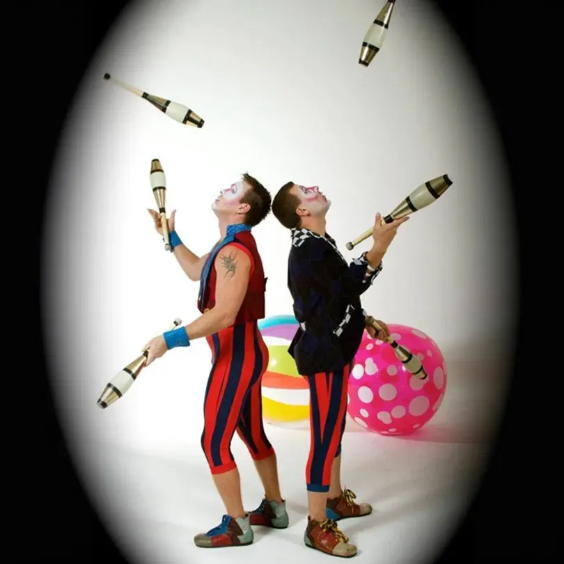 Milanus Circus, Miami, FL, juggling performers.