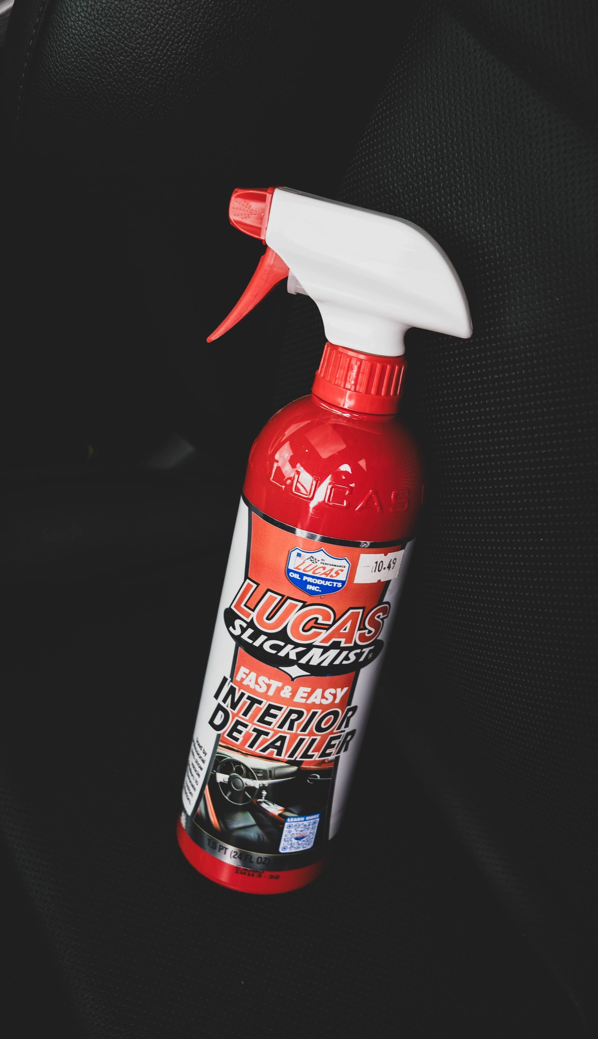 Red and white Lucas Slick Mist interior detailer spray bottle. | Mountain Top Service Center