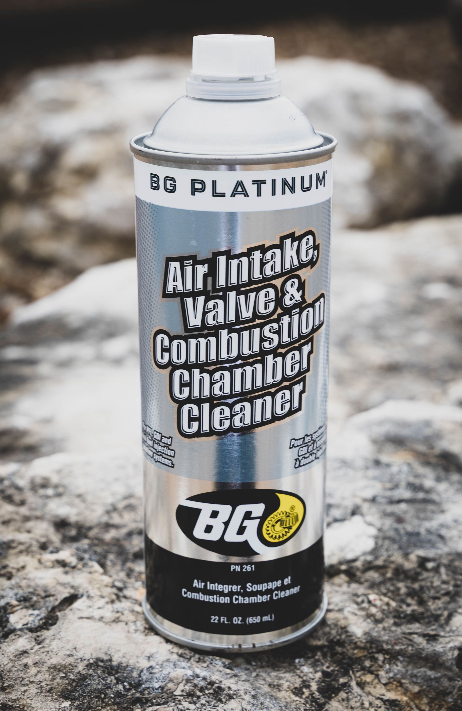 Silver BG Platinum Air Intake Cleaner spray can on a rock. | Mountain Top Service Center