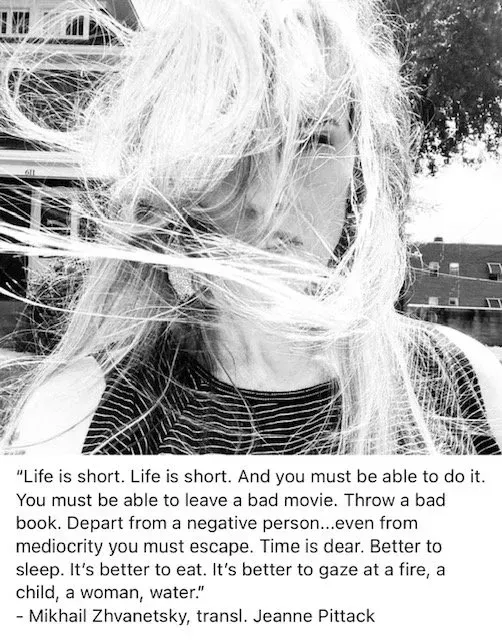 Woman with windblown hair, text: