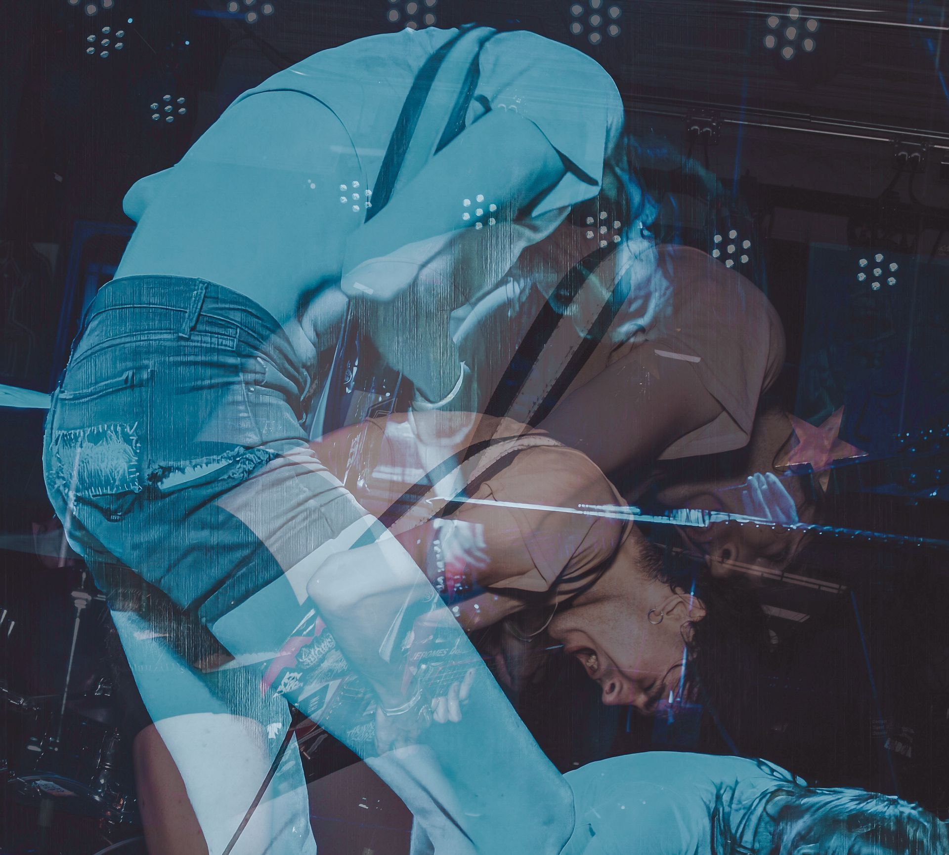 Woman in denim shorts and tank top, multiple exposures, dancing, blue tones.