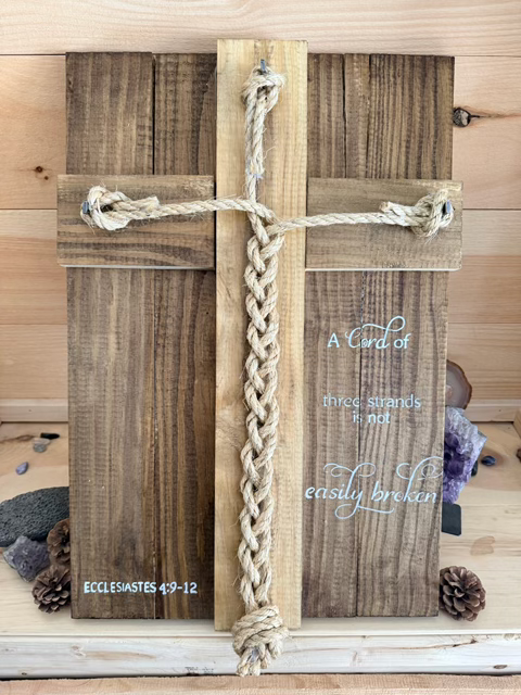 A hand crafted cross made out of wood by Rough Cut Wood