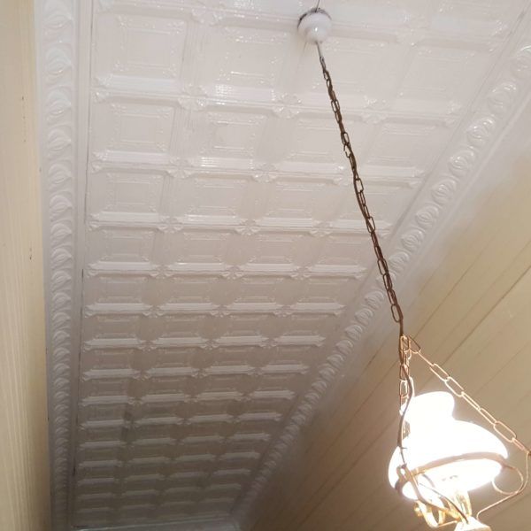 A light hanging from a fresco ceiling in a hallway — Axis Painting in Coffs Harbour, NSW