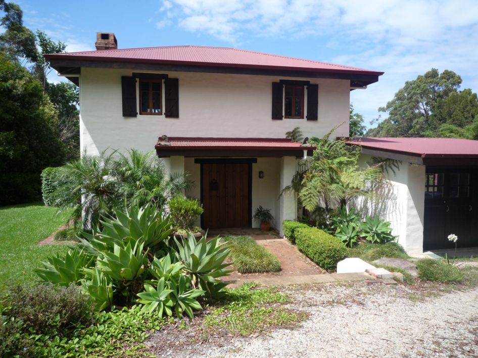 A White House With a Red Roof and Black Shutters — Axis Painting in Coffs Harbour, NSW