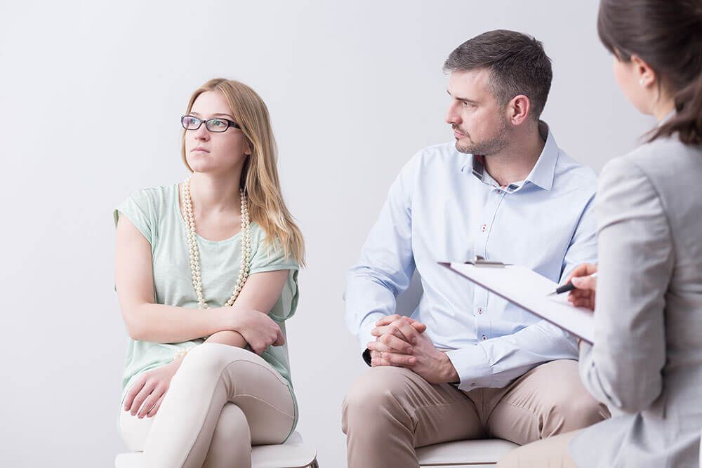 Couple in Therapy, Looking Away From Each Other — Umbrella Legal in Cardiff, NSW