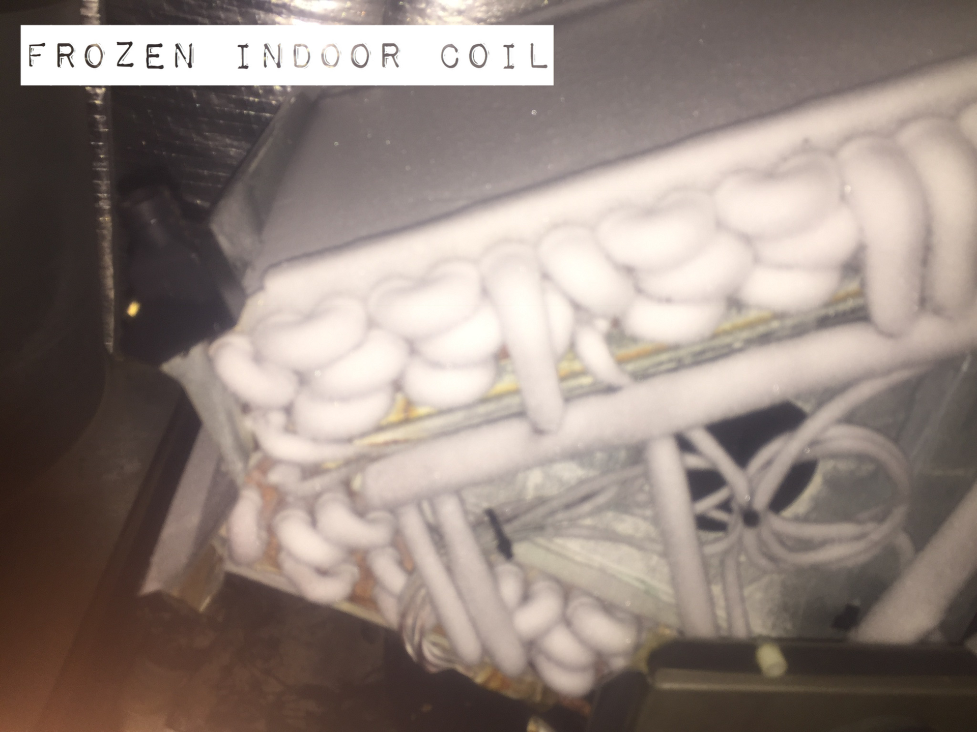 A close up of a frozen indoor coil