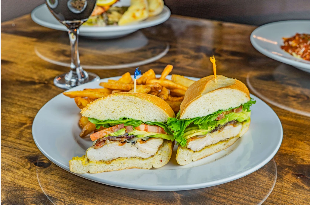 Grilled Chicken and Avocado Club Sandwich with Fries