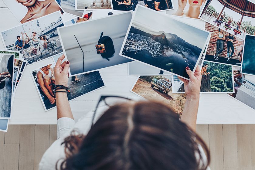 A woman holding images