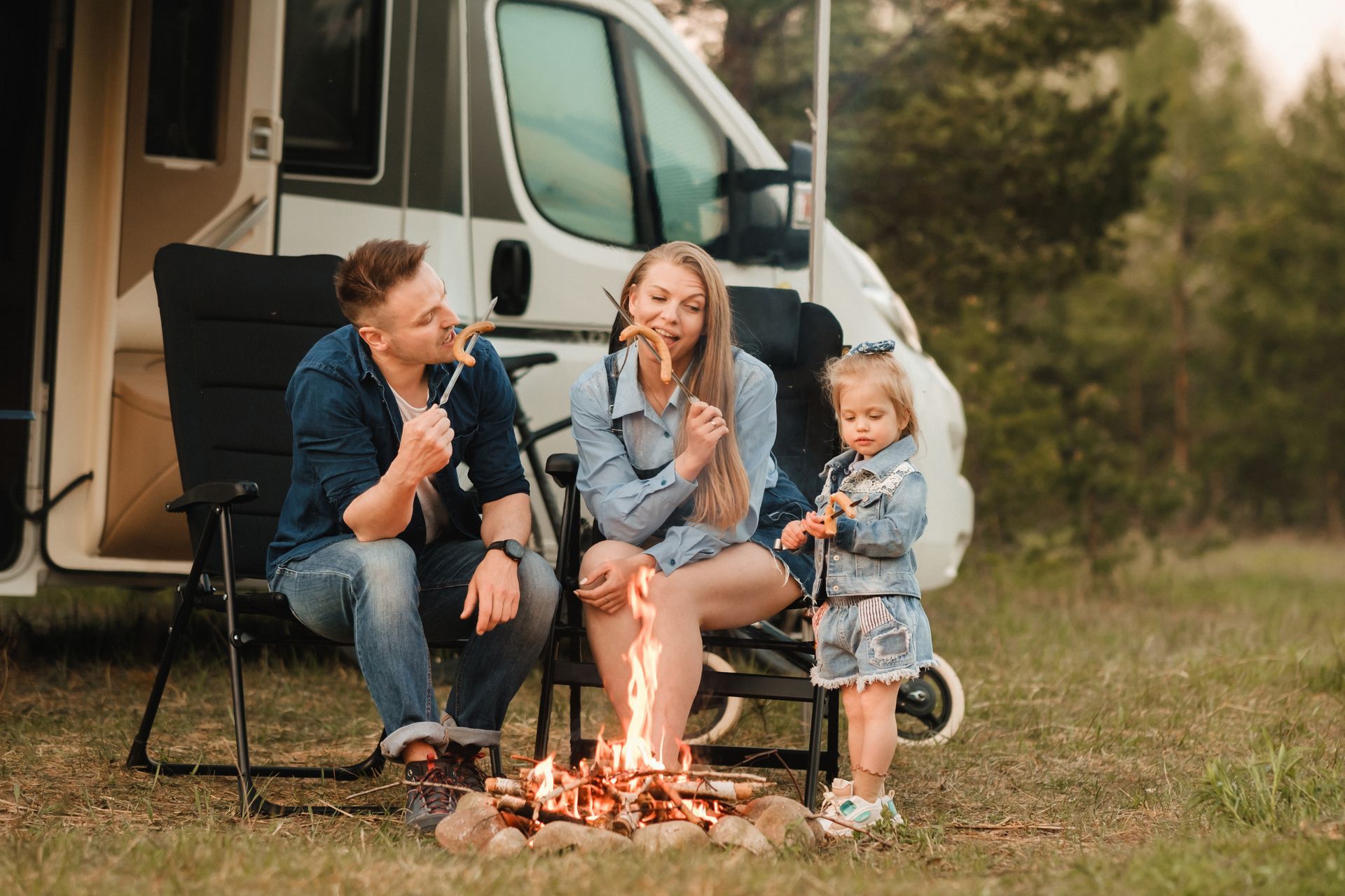 A family is standing in front of a door in a hallway.