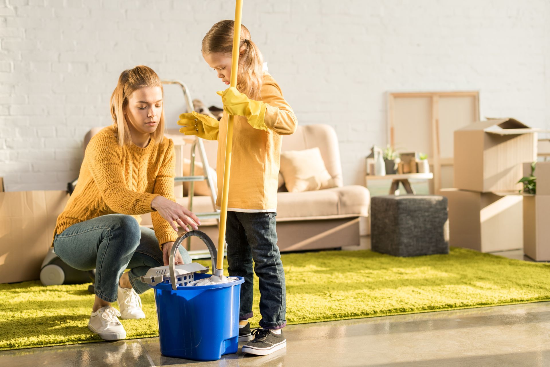 A family is standing in front of a door in a hallway.