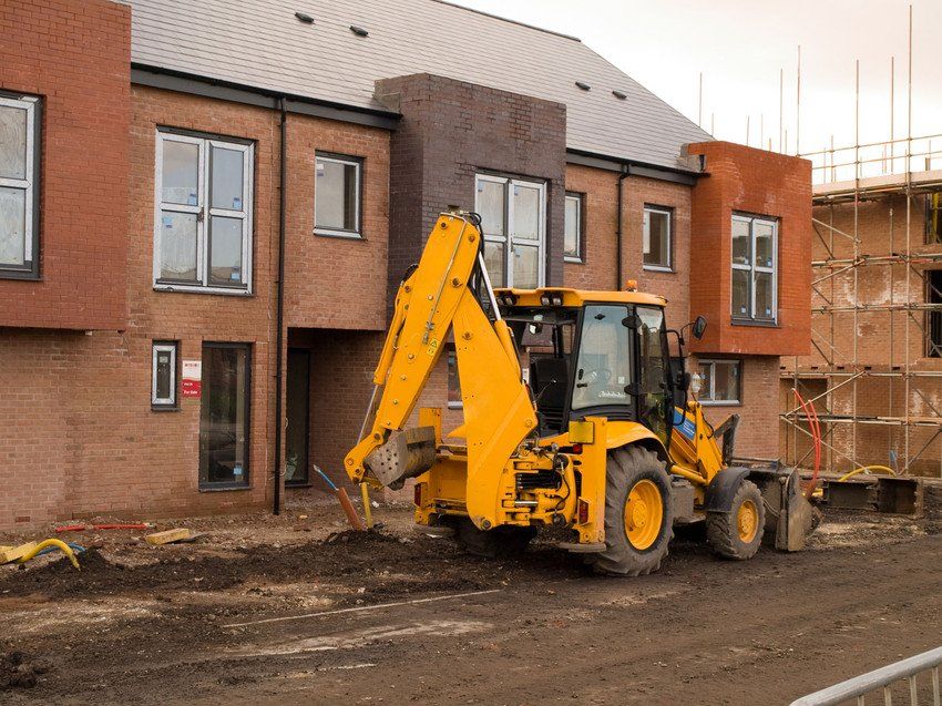 JCB Digger at Construction Site New Build Houses