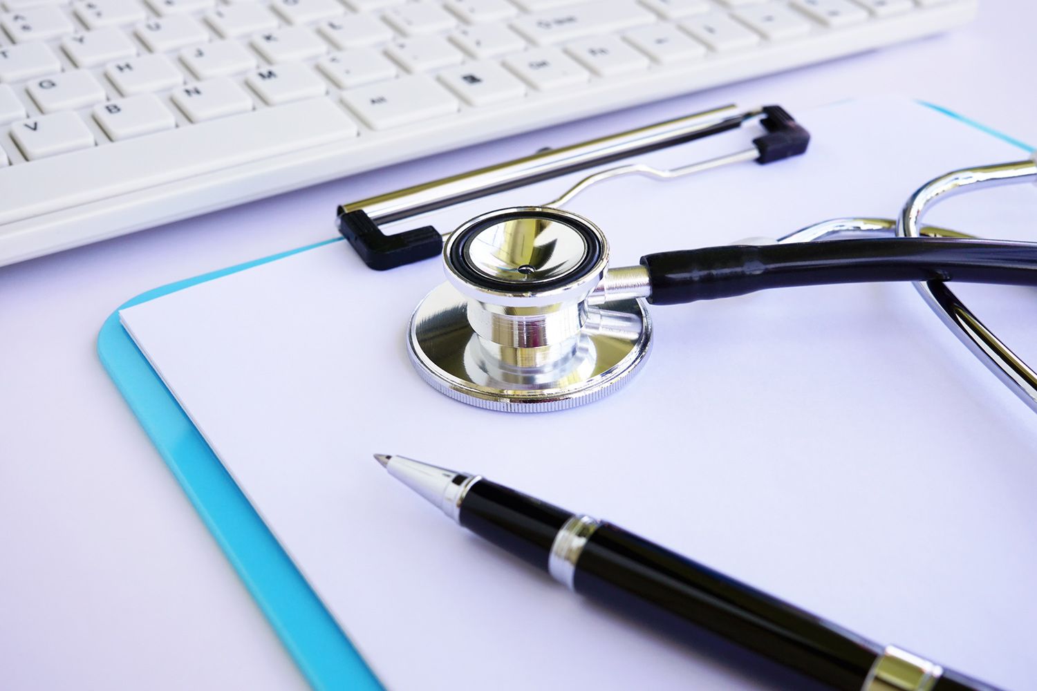 Stethoscope, Clipboard and Pen on Table — Hammond, LA — Internal Medicine Clinic of Tangipahoa