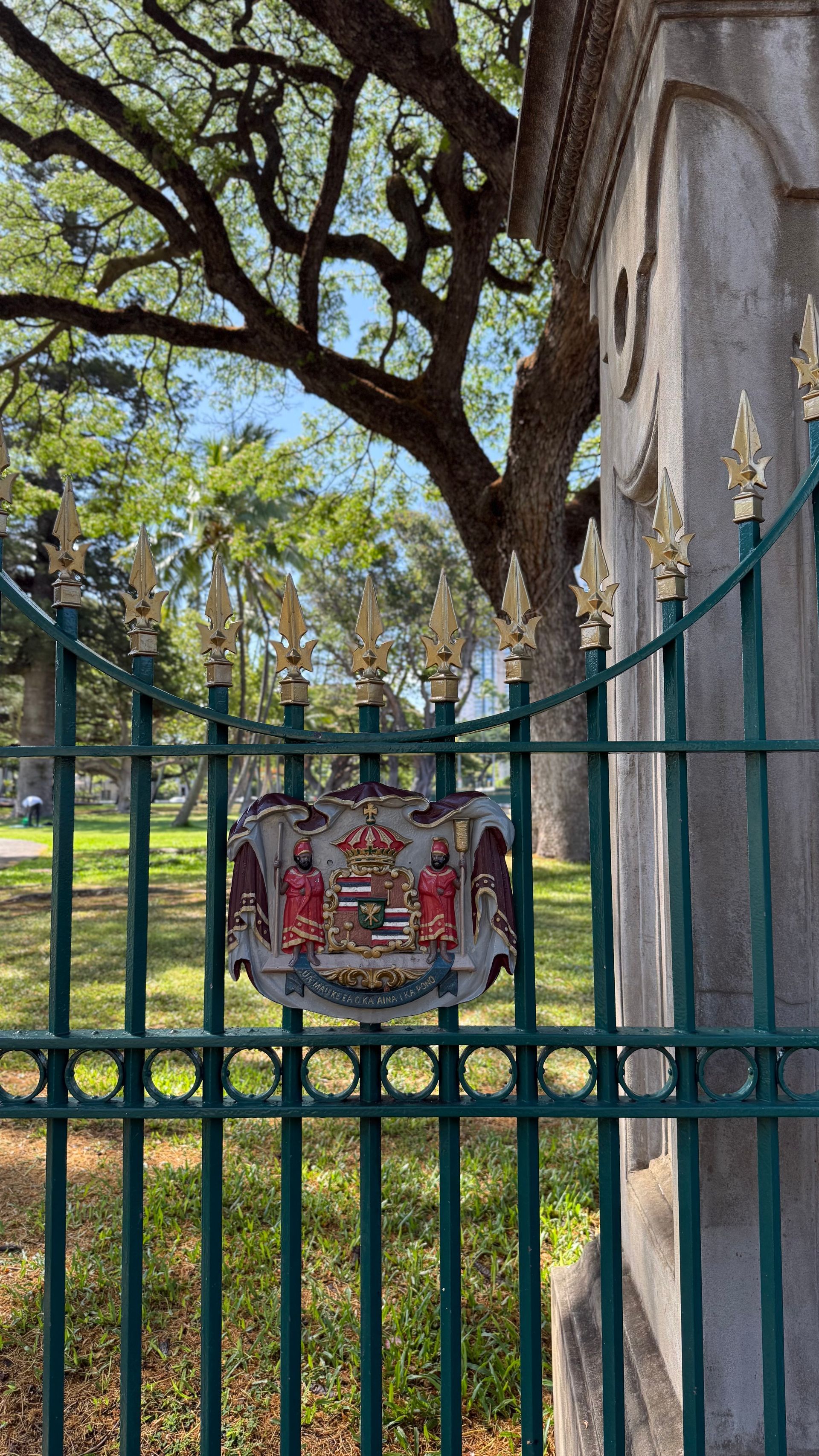 An aerial view of a beach with a mountain in the background.