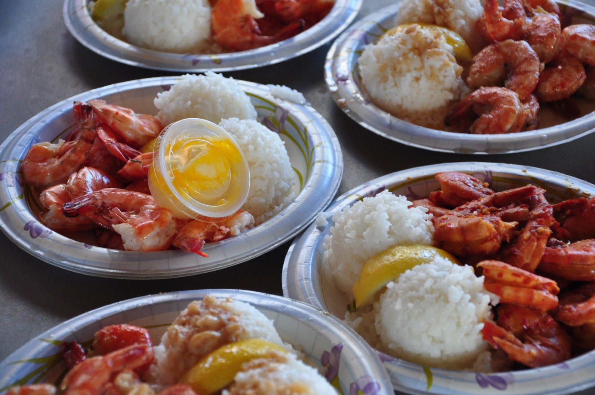 Plate with shrimp and rice on a table