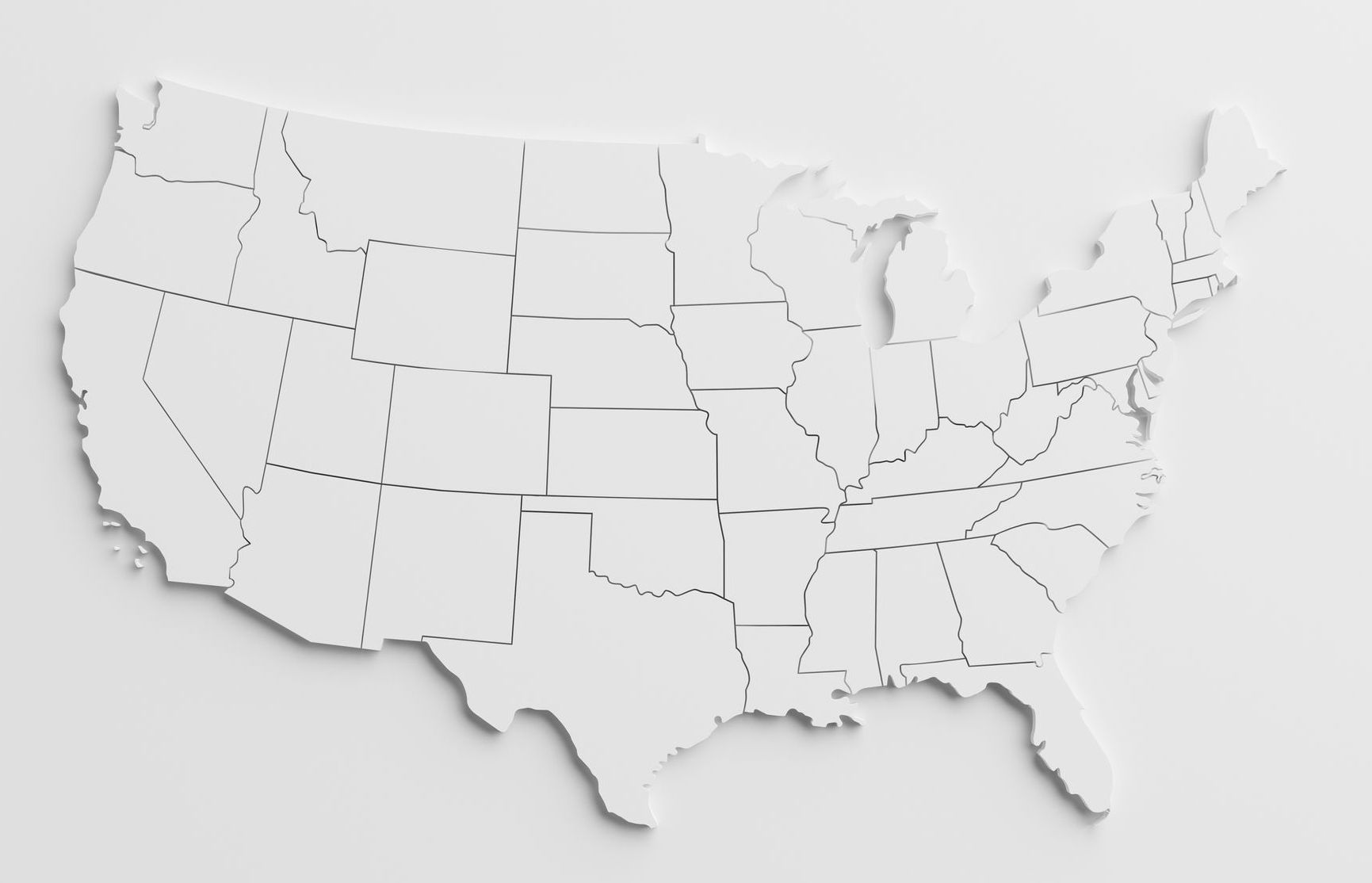 A cut-out map of the united states on a white background.