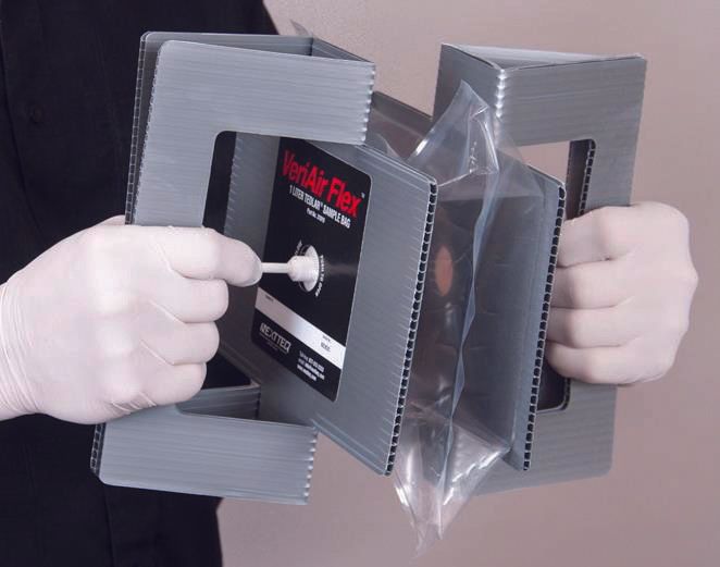 A man is taking an air sample using a VeriAir Flex® Tedlar® Sample Bag.